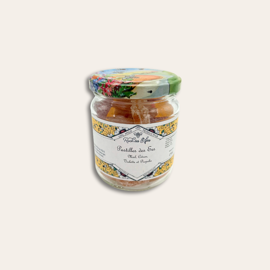 Pastilles miel à personnaliser Bocal en verre et des pastilles à l'intérieur avec une étiquette collée.