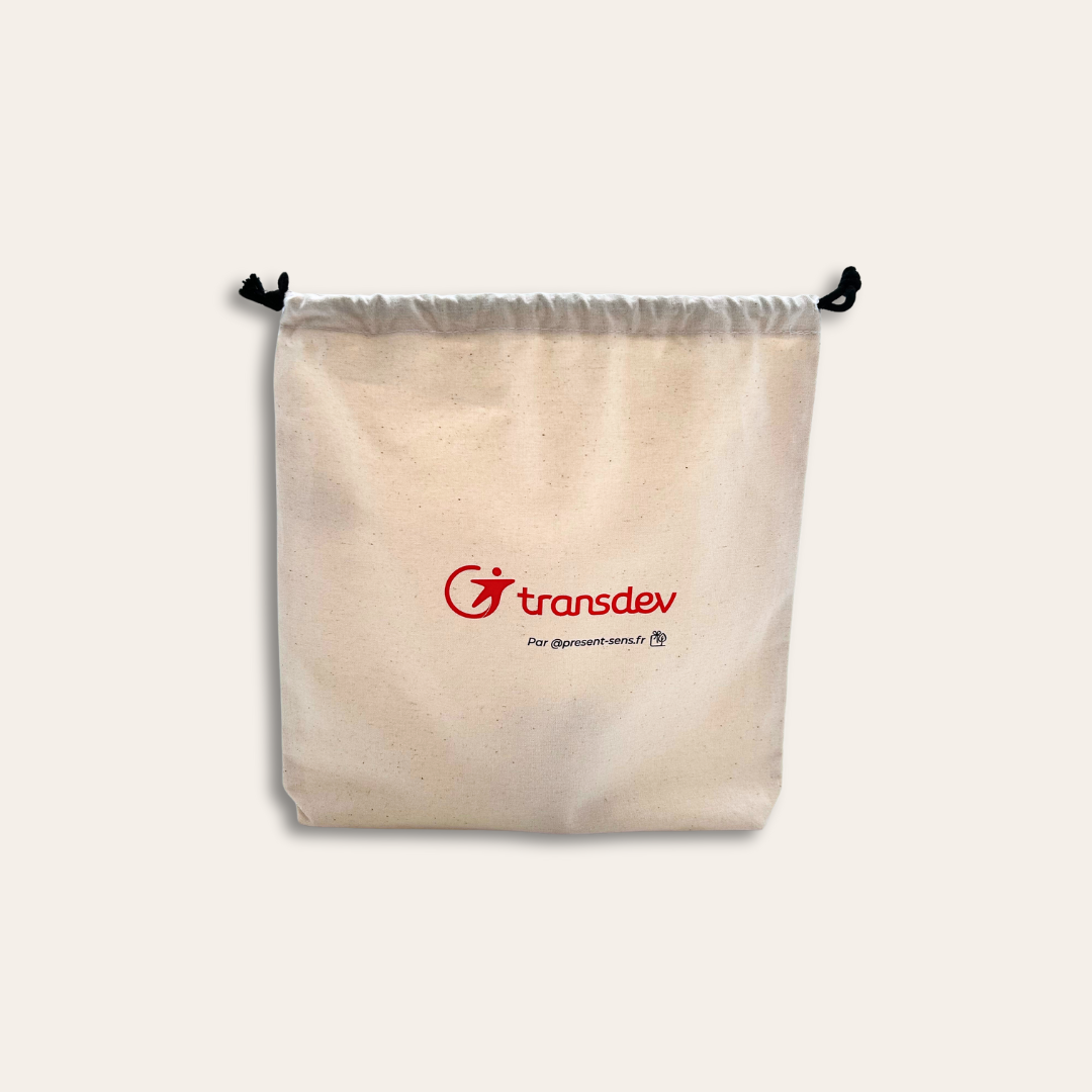 Pochon beige avec transdev écrit dessus.