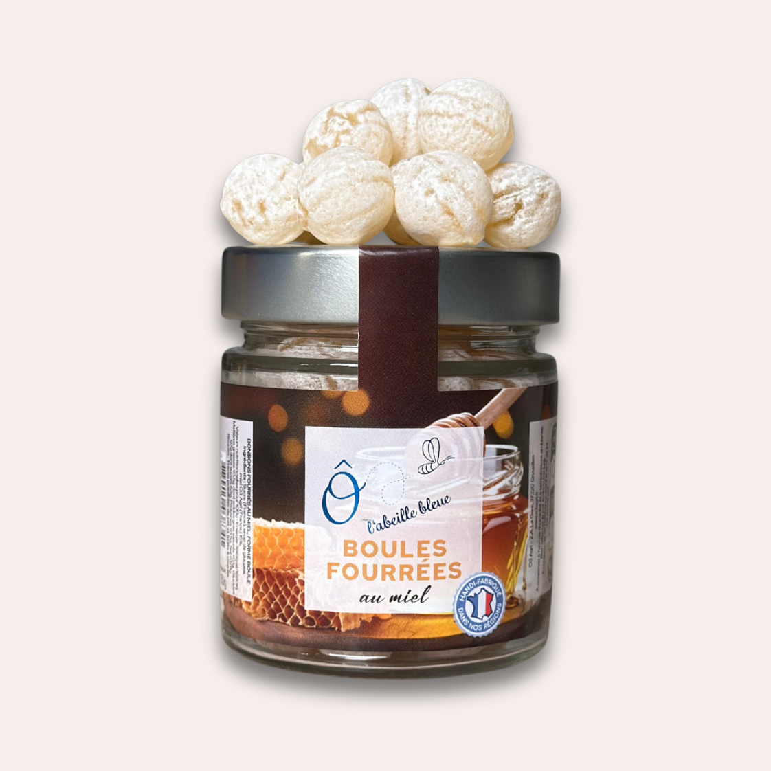 boules fourrées au miel 100% solidaire pot boules fourrées au miel avec boules posées dessus